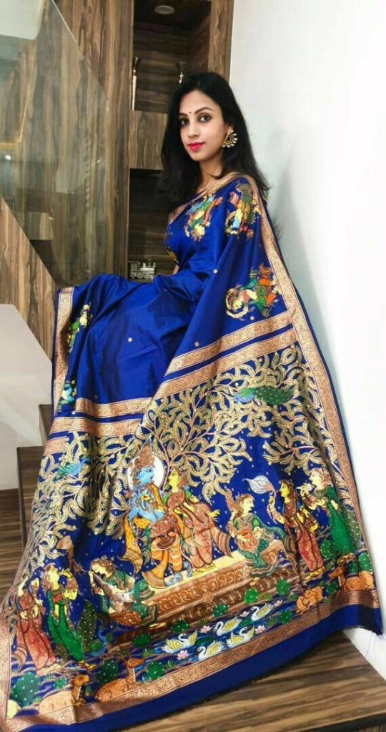 Kalamkari styling This is the image of a women wearing a blue Kalamkari saree.