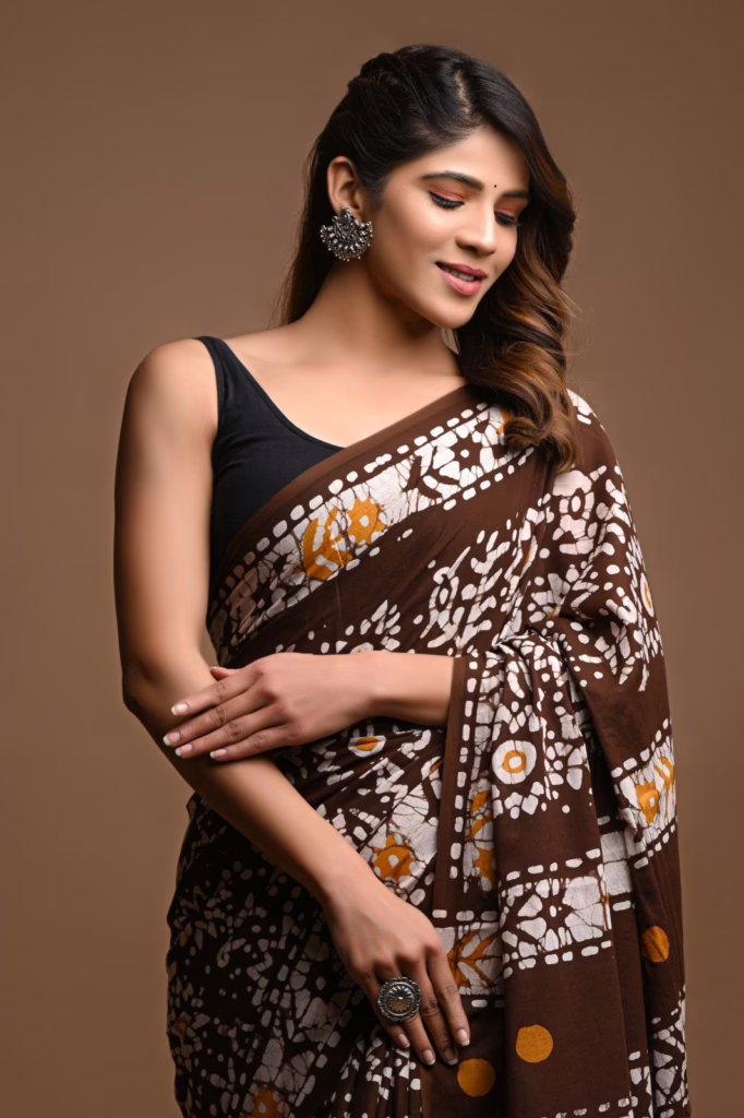 This is an image of a brown Batik printed saree to help people understand how it looks 