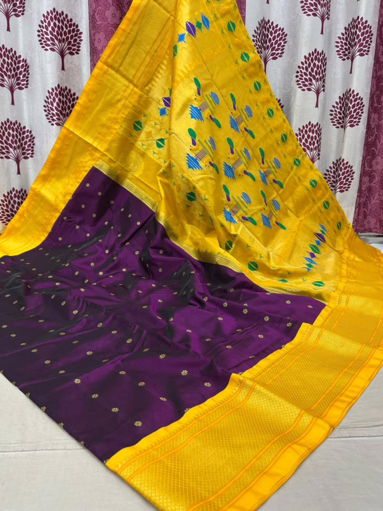 Paithani Sarees: A Masterpiece in Traditional Handicrafts (Written by Sophia Shome) 2 Paithani Sarees: A Masterpiece in Traditional Handicrafts (Written by Sophia Shome) This is an image of a beautiful purple Paithani saree with a yellow border