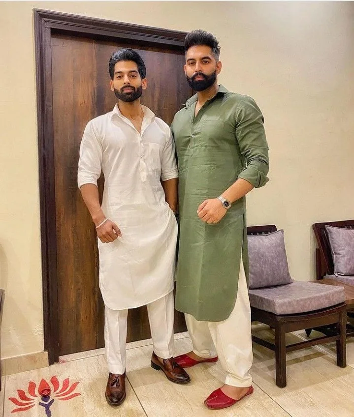 2 men wearing Loafers and Mojaris, which are looking best with Pathani Kurta
