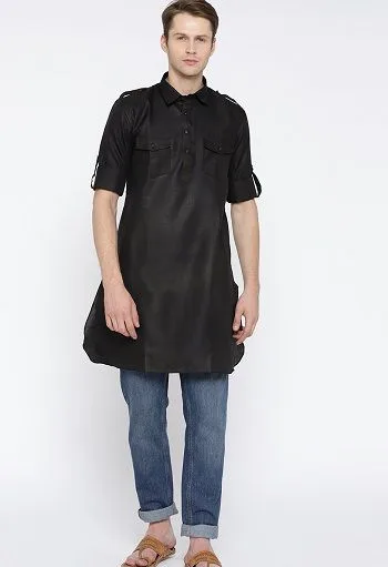 A man has paired Pathani Kurta with dark coloured jeans