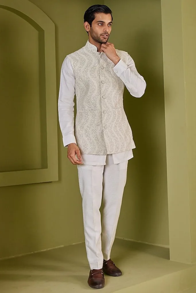 5 Trendy Ideas for Men's Short Kurta Every Man Should Know 4 5 Trendy Ideas for Men's Short Kurta Every Man Should Know A man has layered Short Kurta with Nehru Jacket