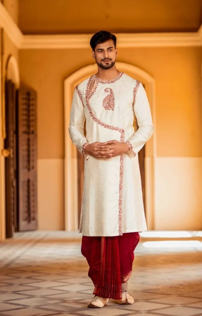 5 Elegant Traditional Bengali Outfits Every Man Must Try 6 5 Elegant Traditional Bengali Outfits Every Man Must Try A man has paired Dhuti Panjabi, one of the popular traditional Bengali outfits.