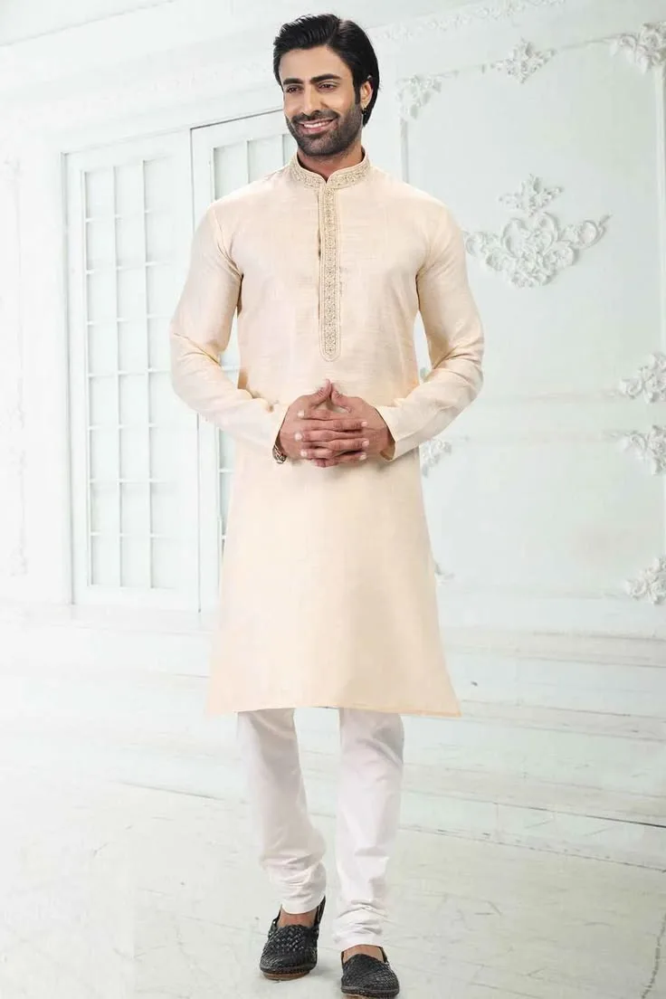 A man wearing a linen kurta pajama which is ideal for formal and traditional occasions like wedding 