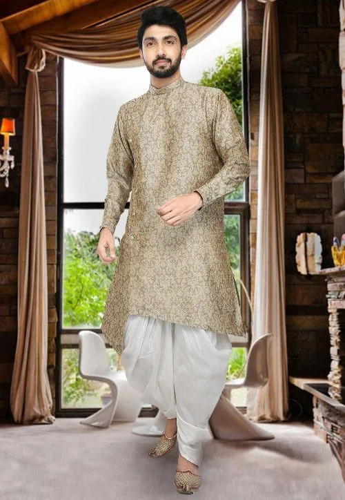A man wearing a printed kurta with dhoti pants