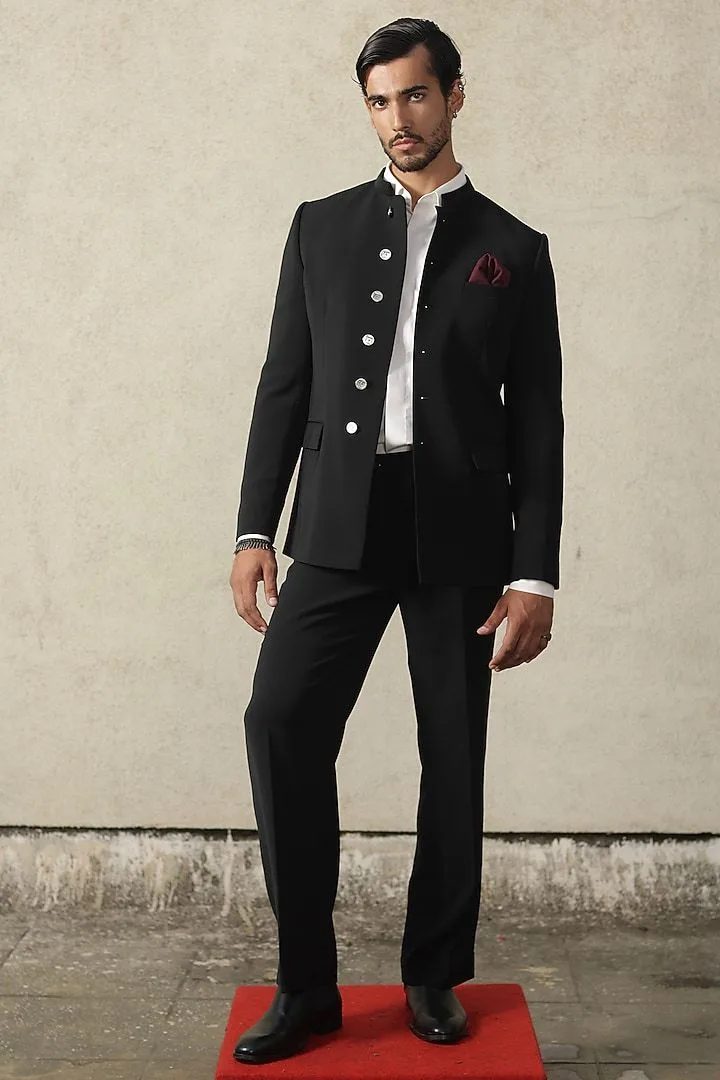 A man wearing a Bandhgala suit with a shirt