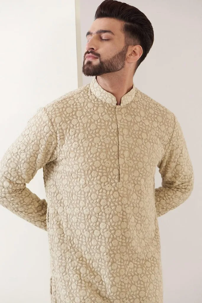 A man wearing a detailed embroidered men's Chikankari kurta